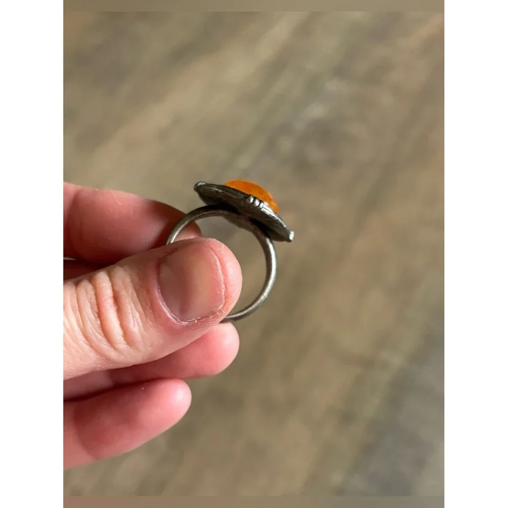 Untested women’s size 13.5 metal butterscotch amber or orange spiny oyster ring